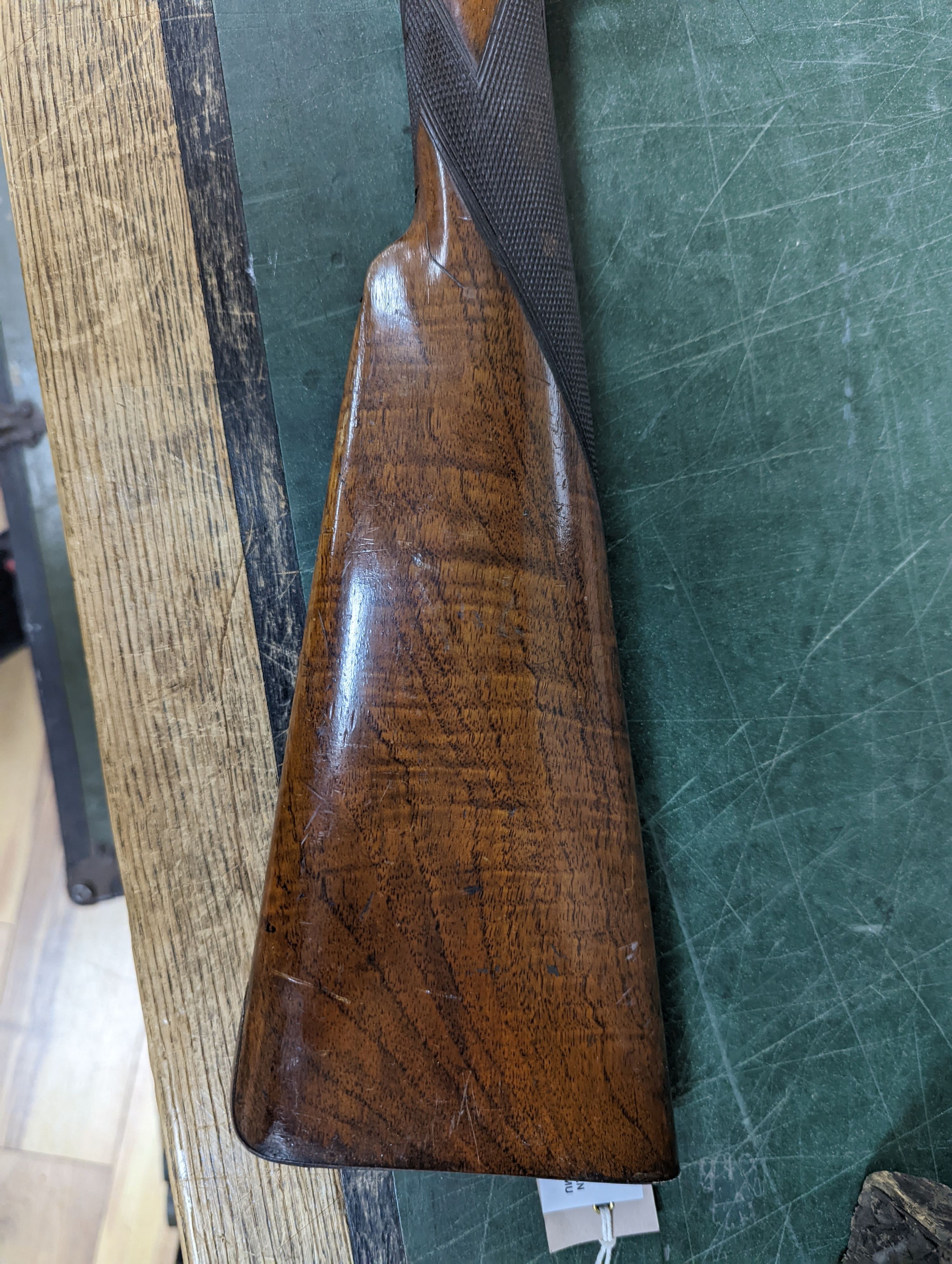 Two 19th century percussion muskets, 103cm. max., one double-barrelled